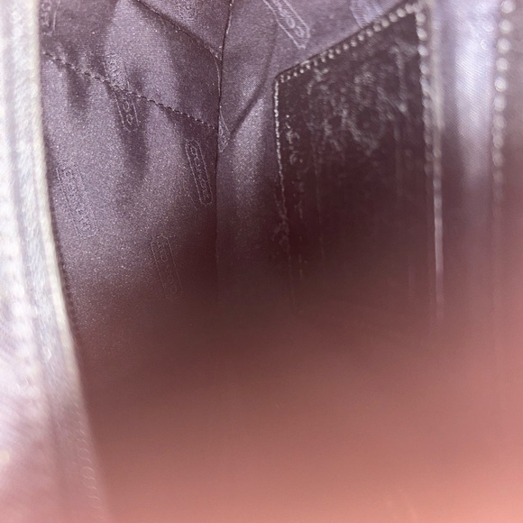 Vintage Coach shoulder bag. There are no tears or rips.  A bit of wear on seams - Picture 3 of 4